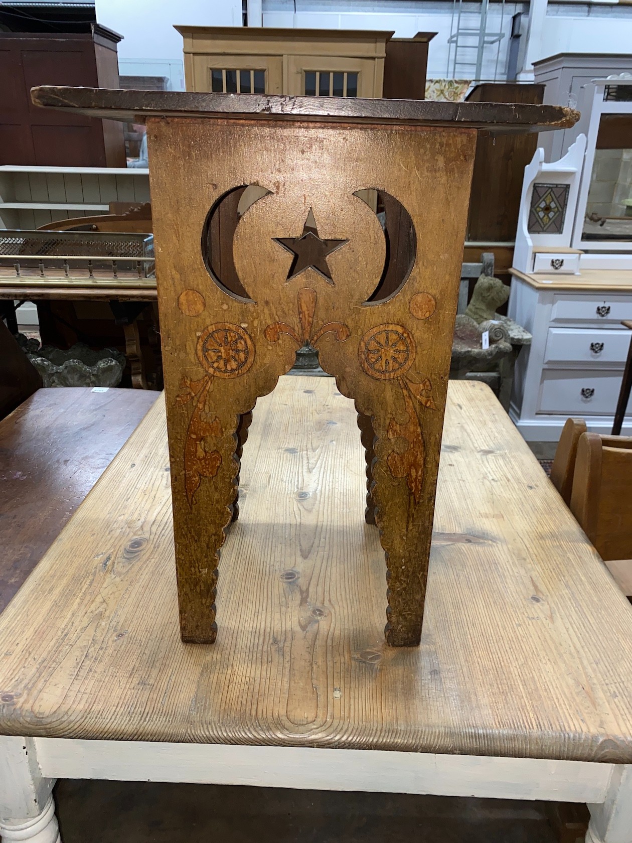 An Edwardian pokerwork occasional table, width 45cm